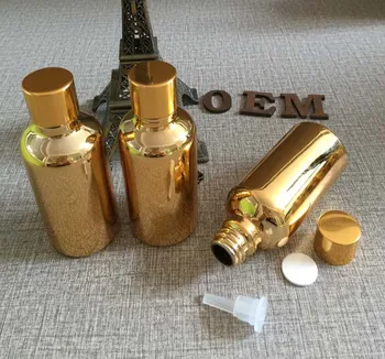 Aukštos kokybės 50ml aukso eterinių aliejų stiklo butelių pardavimas , didmeninė turas tuščias golden 50 ml stiklo buteliuko lašintuvu urmu